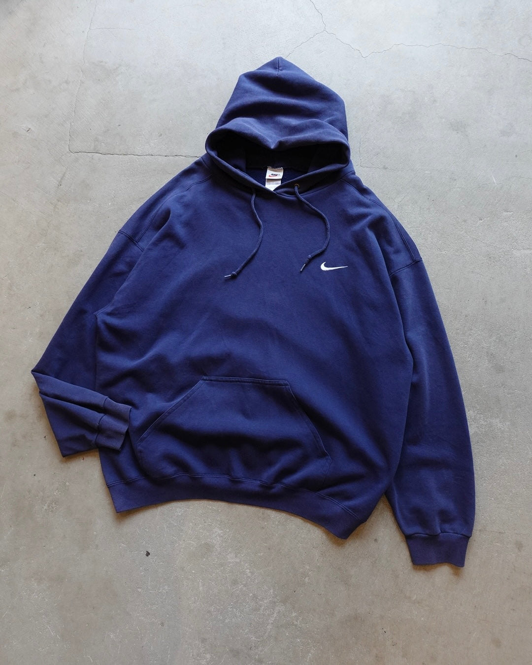 90sUSA製NIKE 同色スウォッシュブルーフーディー フェードXL 人気希少 90s NIKE Swoosh Hoodie Made in USA ネイビー | dada